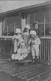 5 children on verandah